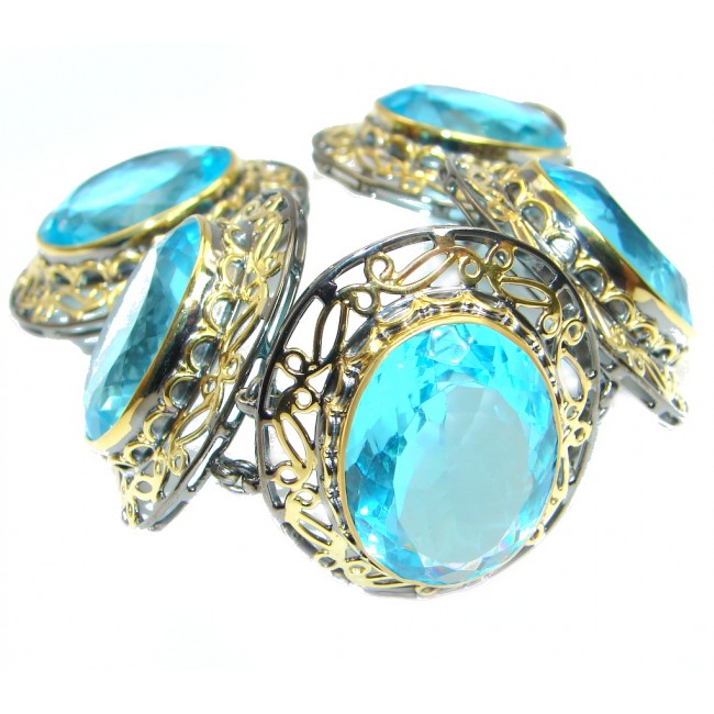 Giant Blue Ocean simulated Blue Topaz Gold Rhodium plated over Sterling Silver handcrafted Bracelet