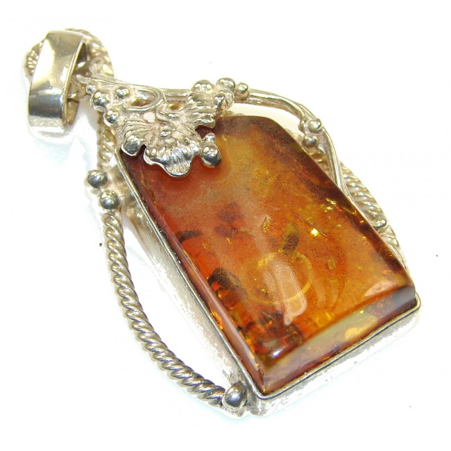 Classy Brown Polish Amber Sterling Silver Pendant