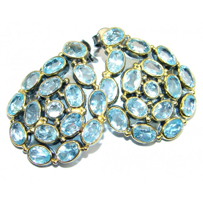 Thousands Stars Swiss Blue Topaz Rose Gold plated over Sterling Silver handcrafted stud earrings