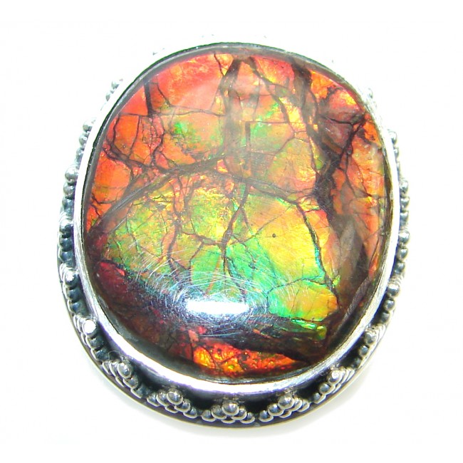 Authentic Canadian Orange Fire Ammolite Sterling Silver ring size adjustable