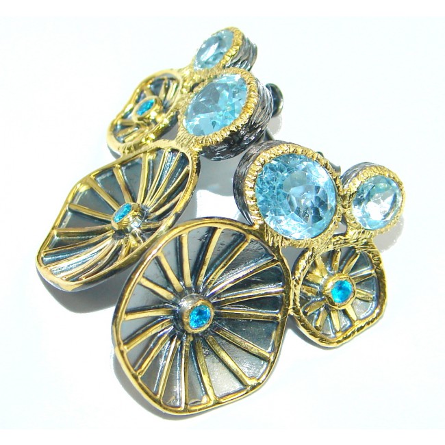 Deluxe genuine Swiss Blue Topaz Garnet Gold plated over Sterling Silver earrings