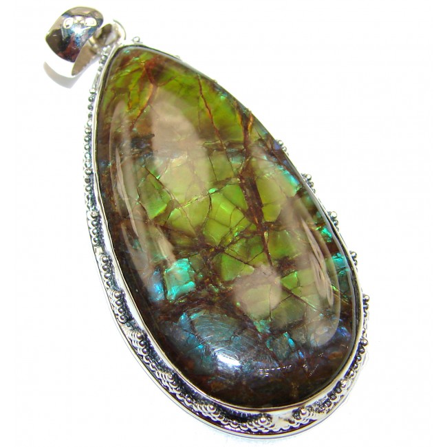 One of the kind genuine Canadian Ammolite .925 Sterling Silver handcrafted Pendant