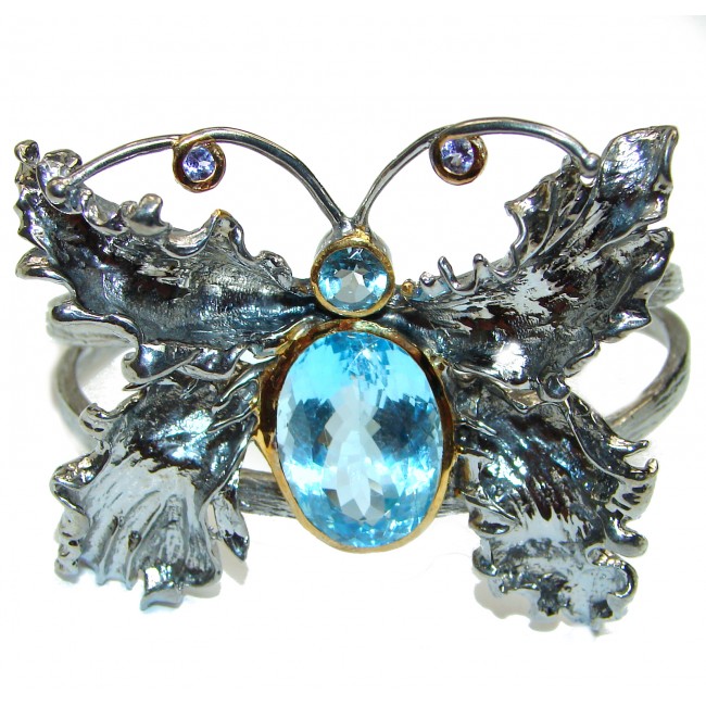 Enchanted Beauty Butterfly Swiss Blue Topaz 24K Gold over .925 Sterling Silver antique patina Bracelet / Cuff