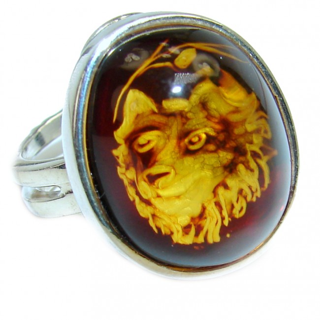 A Wolf Authentic Baltic Amber .925 Sterling Silver handcrafted ring; s. 8 adjustable