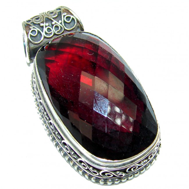 33.5 carat Genuine Red Quartz .925 Sterling Silver handcrafted pendant