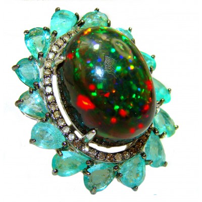 A COSMIC POWER Genuine 18.95 carat Black Opal Emerald 14K White Gold over .925 Sterling Silver handmade Ring size 7 1/4