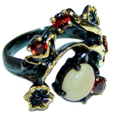 Genuine 4.5 carat Ethiopian Opal black rhodium over.925 Sterling Silver handmade Ring size 8