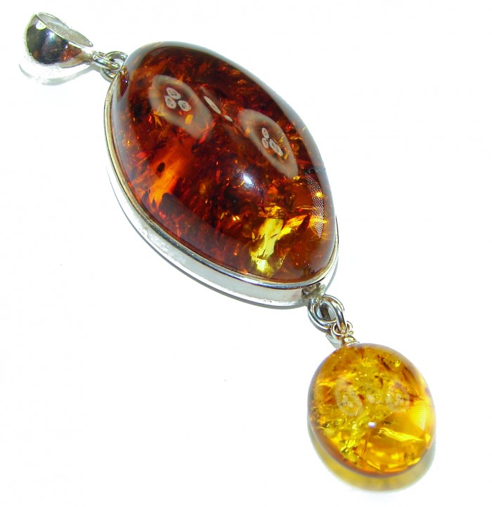 The best quality authentic Golden Baltic Amber .925 Sterling Silver handcrafted pendant