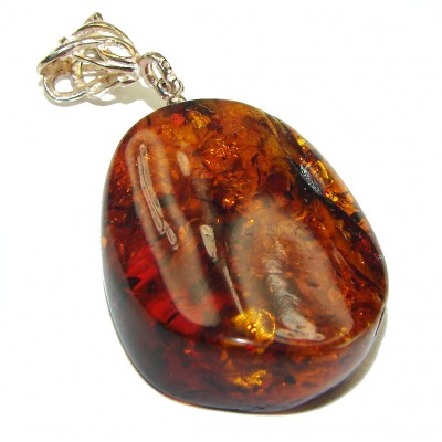 The best quality authentic Golden Baltic Amber .925 Sterling Silver handcrafted pendant