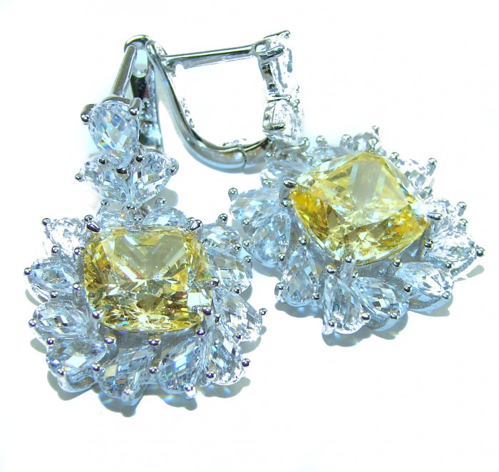 15.5 carat Golden - yellow Montana Sapphire .925 Sterling Silver handcrafted earrings