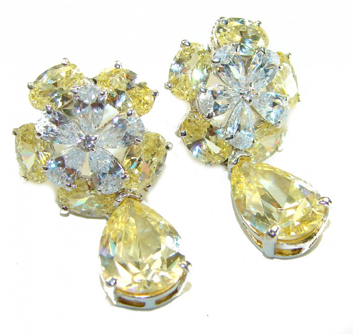 Luxurious 10.5 carat Golden - yellow Montana Sapphire .925 Sterling Silver handcrafted earrings