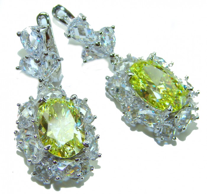 Luxurious 10.5 carat Golden - yellow Montana Sapphire .925 Sterling Silver handcrafted earrings