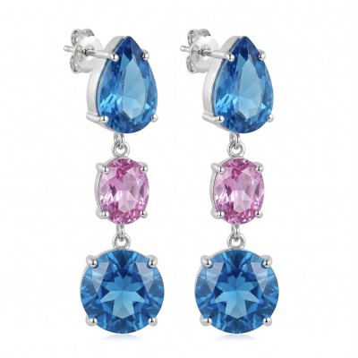 Exquisite 24.7 carat Swiss Blue Topaz rhodium over .925 Sterling Silver Handcrafted Statement earrings