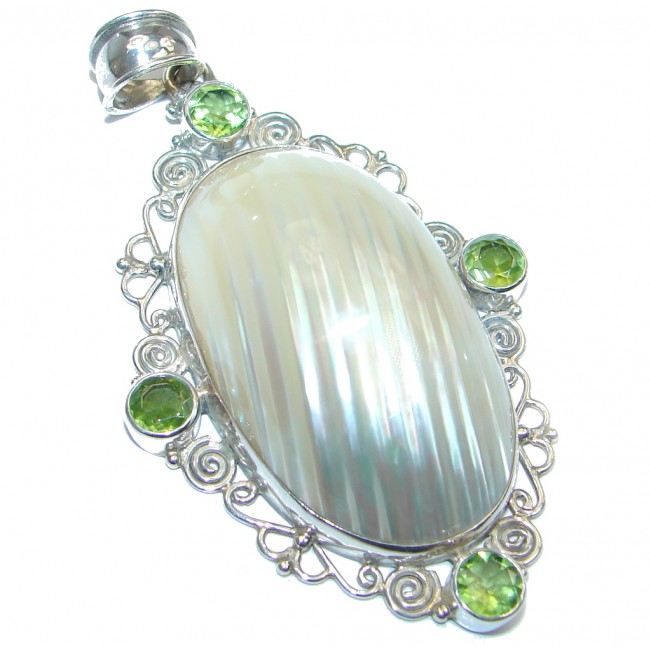 Sublime Peridot Shell Sterling Silver handcrafted Pendant
