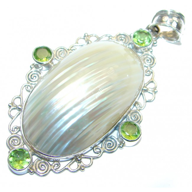 Sublime Peridot Shell Sterling Silver handcrafted Pendant