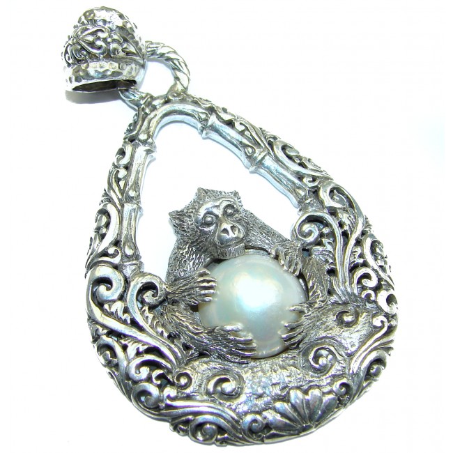 Prosperity and Fortune Monkey holding a white Pearl .925 Sterling Silver pendant