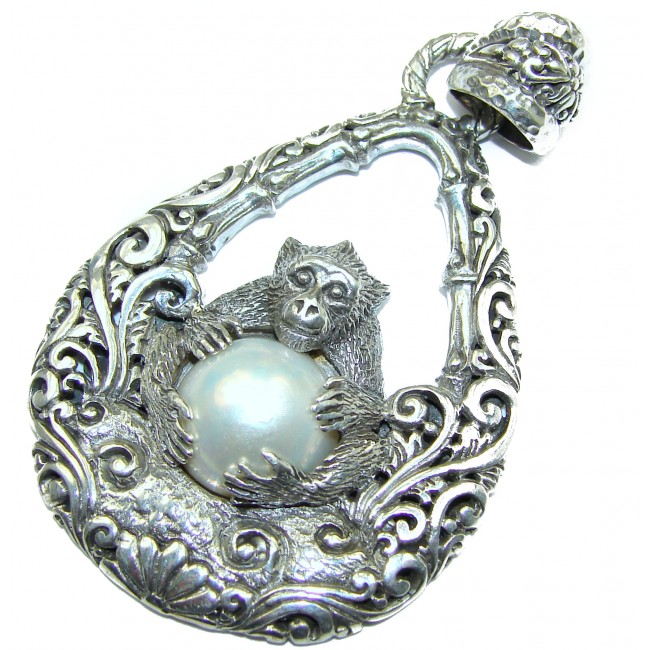 Prosperity and Fortune Monkey holding a white Pearl .925 Sterling Silver pendant