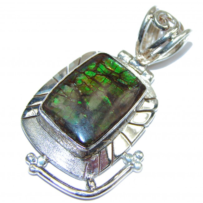 One of the kind genuine Ammolite .925 Sterling Silver handcrafted Pendant