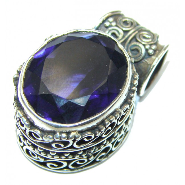 Artisan Design Carved purple Turquoise .925 Sterling Silver pendant