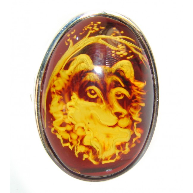 a Dignified Wolf Authentic Baltic Amber .925 Sterling Silver handcrafted ring; s. 8 adjustable