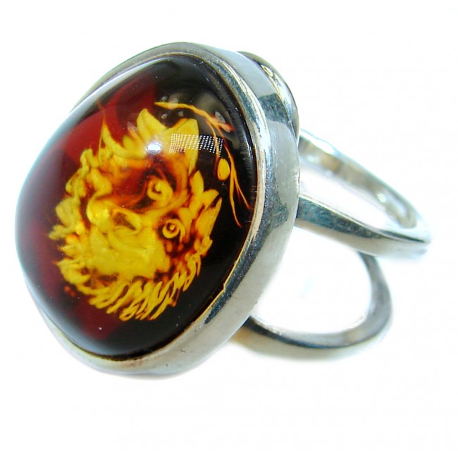 A Wolf Authentic Baltic Amber .925 Sterling Silver handcrafted ring; s. 8 adjustable