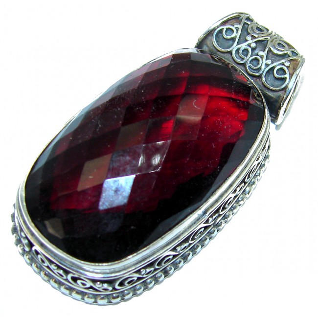 33.5 carat Genuine Red Quartz .925 Sterling Silver handcrafted pendant