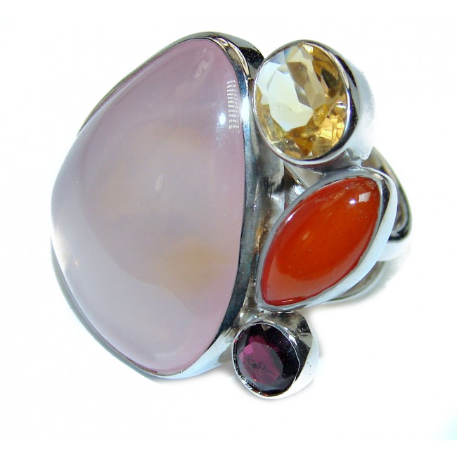 Large 23.2 carat Rose Quartz .925 Sterling Silver brilliantly handcrafted ring s. 7 adjustable