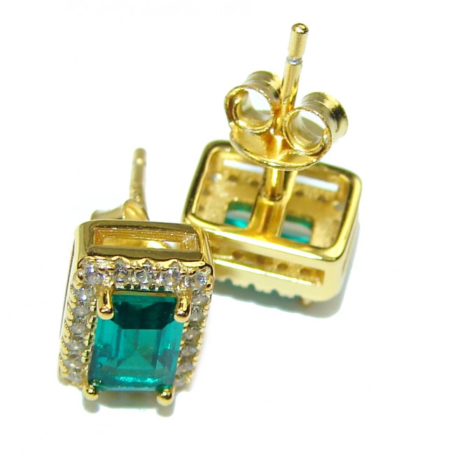 925 Sterling Silver plated with 14k Gold Emerald and 0.11 CT. T.W. Diamond Stud Earrings