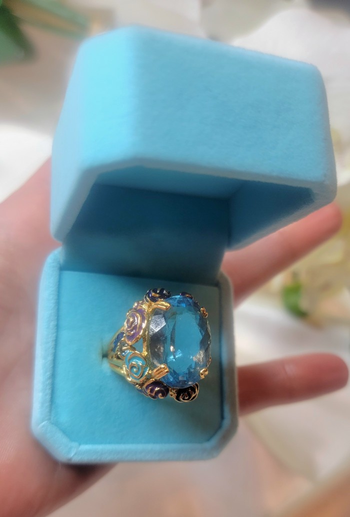 Blue Garden Natural 32.4 carat Swiss Blue Topaz .925 Sterling Silver dipped in 18K Gold handmade Large Statement Ring size 7 1/2 - Blue topaz ring in open box, front view showing intricate setting.