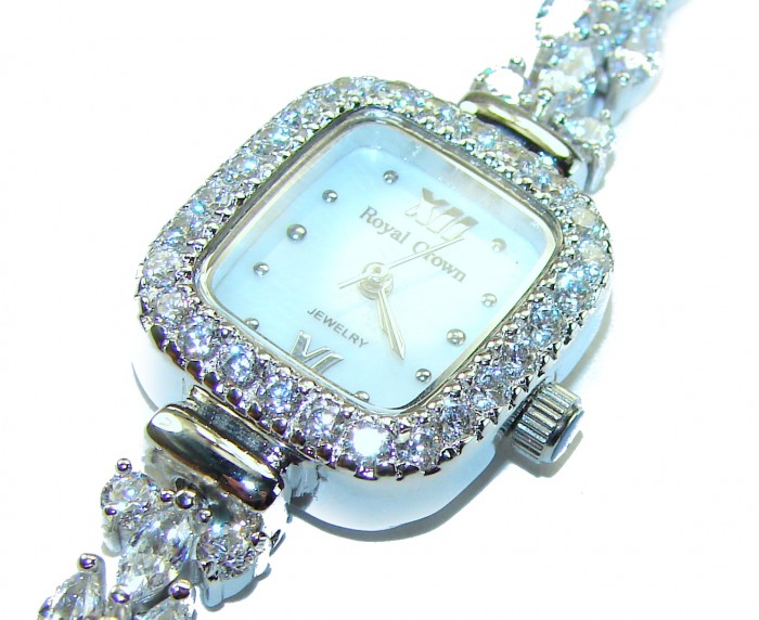 Precious 89.8 carat White Topaz .925 Sterling Silver handmade Bracelet - Watch - Close-up of bejeweled watch face with white topaz and sterling silver.