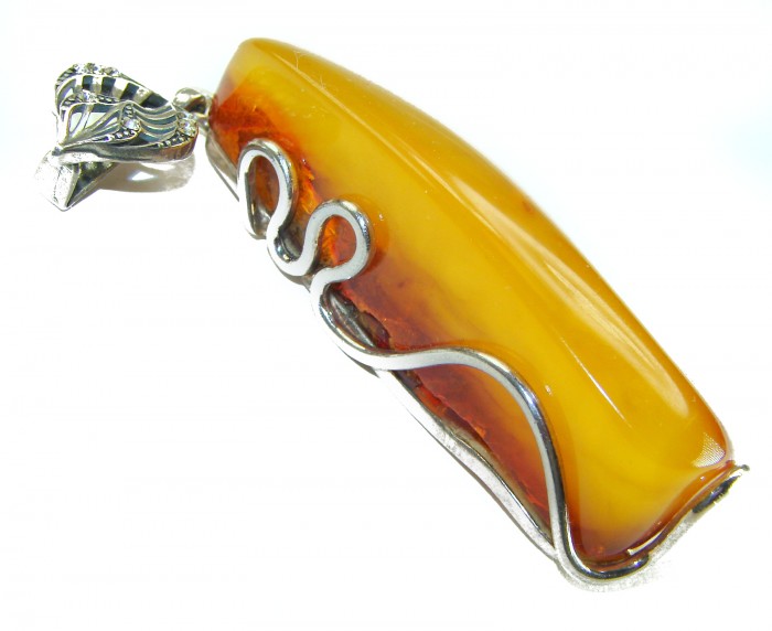 Large Prehistoric Authentic Baltic Amber .925 Sterling Silver beautifully handcrafted Pendant - Side view of large Baltic amber pendant with silver detailing