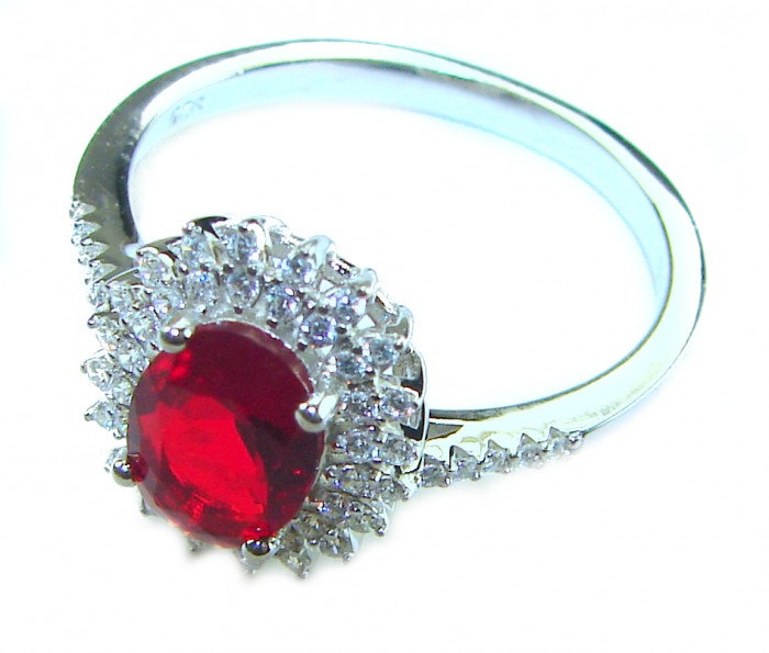 Authentic 2.3 carat Ruby .925 Sterling Silver handmade Cocktail Ring s. 8 1/4 - Ruby and diamond ring in side view, sterling silver band.