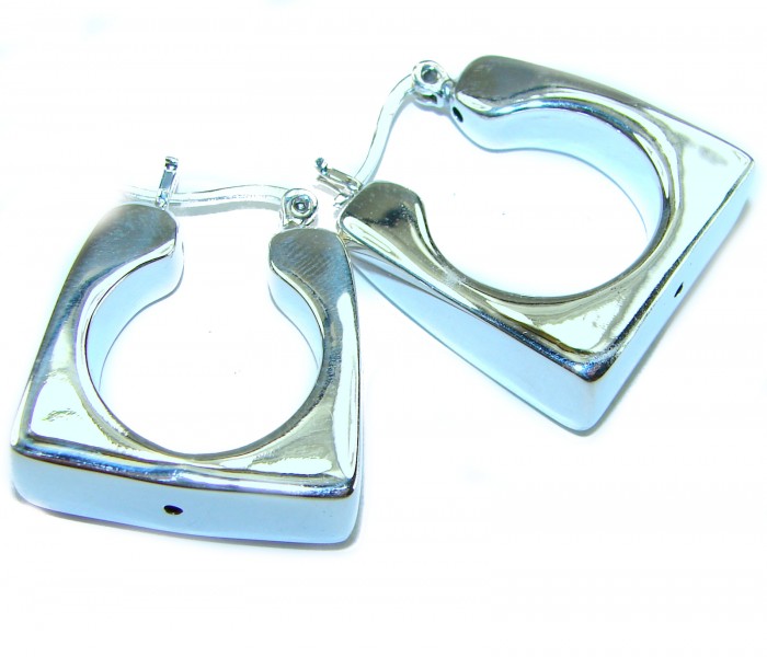 LARGE - EXTRAVAGANZA - Highly Polished Fancy .925 Sterling Silver Italy made Earrings - Top view of large, polished .925 Sterling hoop earrings.
