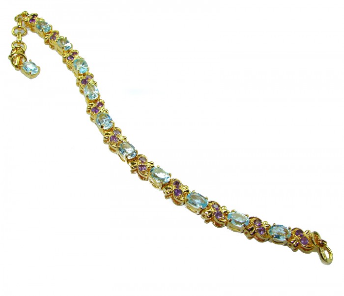 Genuine 24.5 carat Swiss Blue Topaz GARNET 14K Gold over .925 Sterling Silver handcrafted Bracelet - Side view of Swiss Blue Topaz and Garnet 14K gold bracelet.