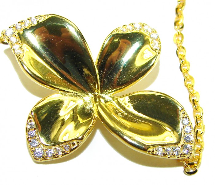 Lotus flower White Topaz highly polished 18K Gold over .925 Sterling Silver Italy made bracelet - Close-up of lotus flower pendant in 18K gold with white topaz accents.