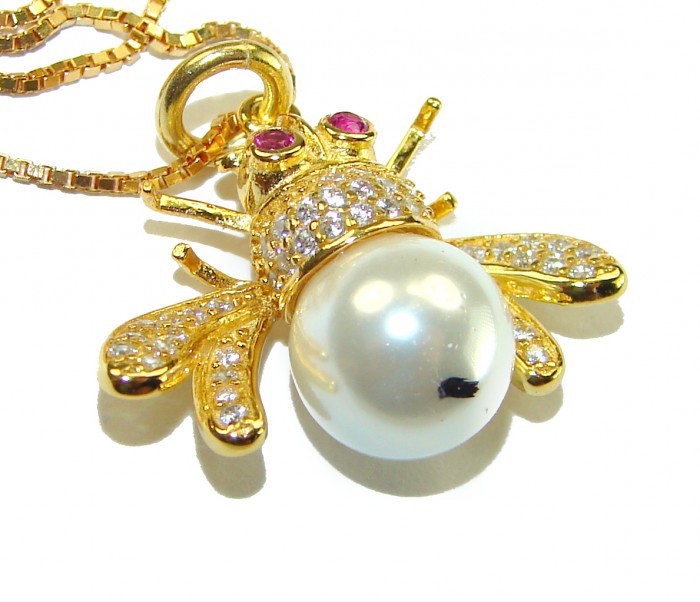 Precious Bees Genuine Pearl 14K Gold Gold over .925 Sterling Silver handcrafted handcrafted Necklace - Bee-shaped pendant with pearl body and gemstone wings, top view.