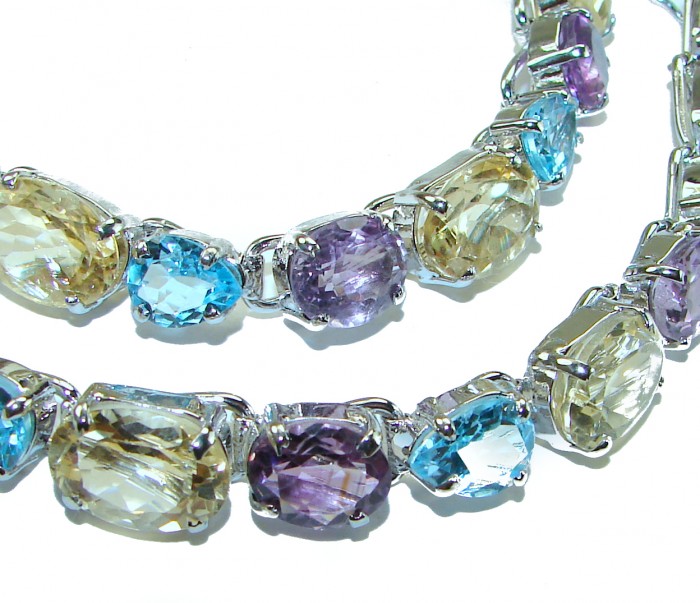 SPECTACULAR Perfect Fusion 225.5 carat authentic MultiGEM .925 Sterling Silver handcrafted necklace - Close-up of multicolored gemstones in a necklace setting.