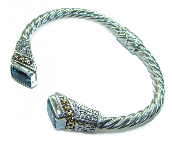 Bali Legacy authentic 8.9 carat Swiss Blue topaz Floral Bracelet in .925 Sterling Silver handcrafted - Side view of Bali Legacy bracelet with Swiss Blue topaz and floral design.