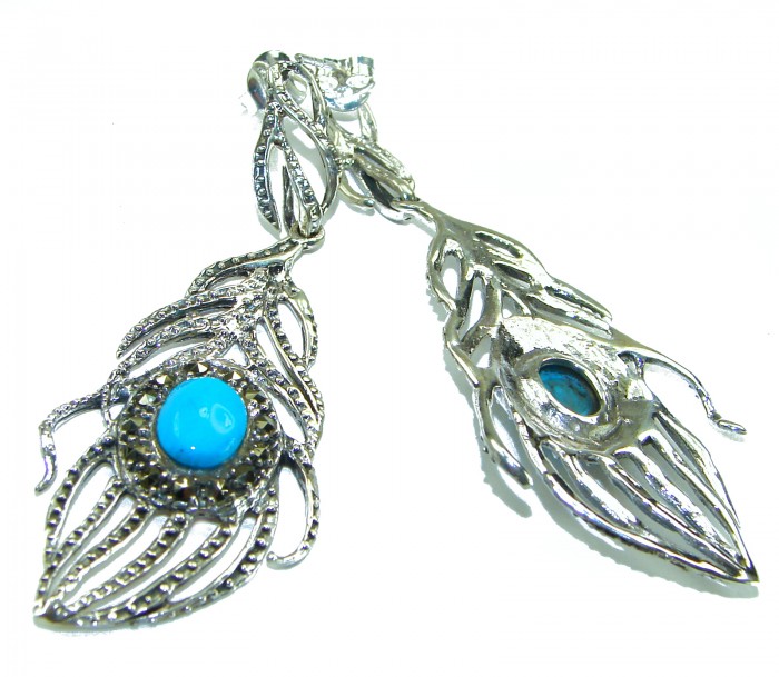 Great Peacocks Feathers authentic inlay Turquoise .925 Sterling Silver handcrafted Earrings - Close-up of peacock feather earrings with turquoise inlay.