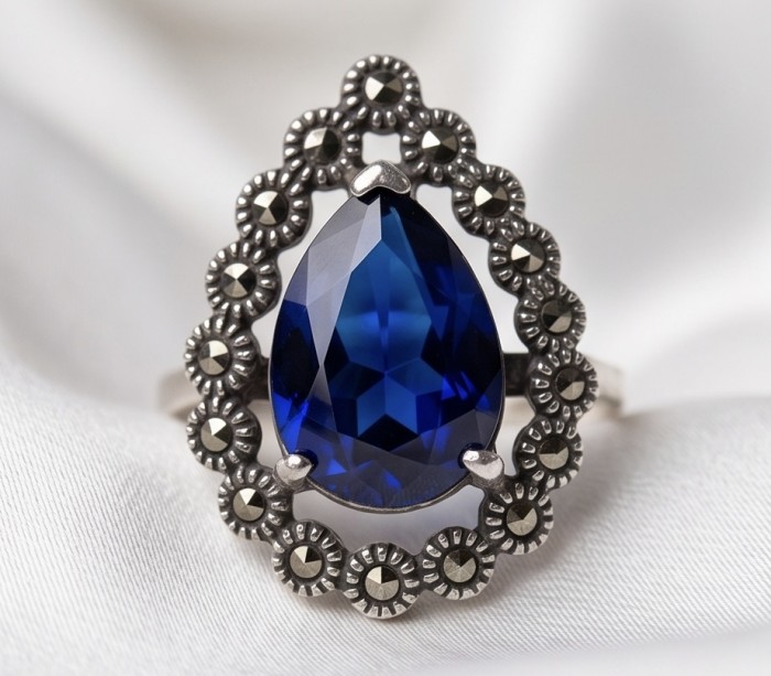 Julietta 12.8 carat London Blue Topaz Marcasite .925 Sterling Silver handmade Statement Ring size 7 1/4 - Close-up of Julietta 12.8 ct London Blue Topaz ring with marcasite accents