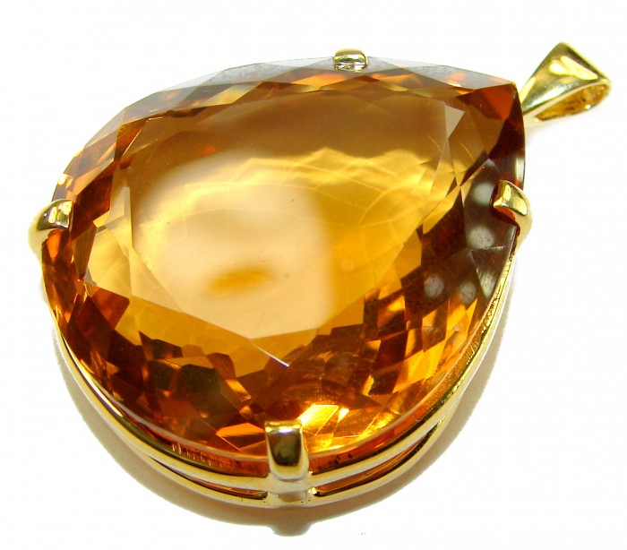 Luxury genuine 53.5 CARAT pear cut Champagne Topaz .925 Sterling Silver dipped in 18K Gold handmade Pendant - Close-up of 53.5 carat pear-cut Champagne Topaz pendant in gold setting.