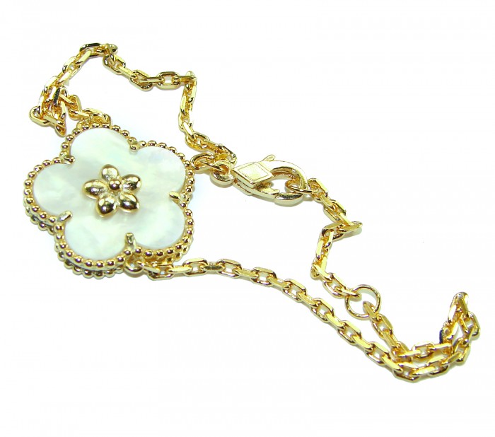 Fantastic Blister Pearl 14K Gold over .925 Silver handmade Bracelet - Gold bracelet with a flower design, close-up view.