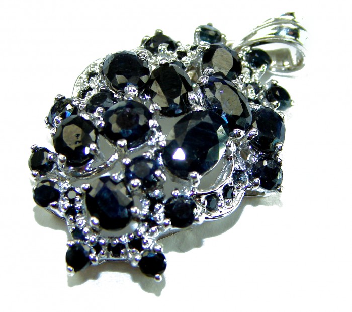 Precious authentic 22.2 carat Sapphire .925 Sterling Silver Eternity handcrafted PENDANT - Close-up of sapphire and sterling silver jewelry piece.