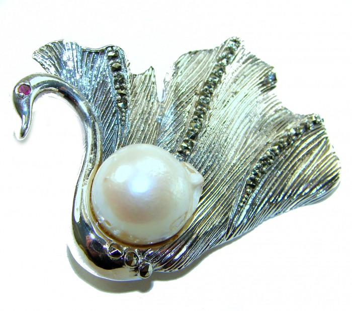 Perfect Swan Mother of Pearl Ruby .925 Sterling Silver handmade Pendant Brooch - Swan-shaped pendant with pearl and ruby, front view.