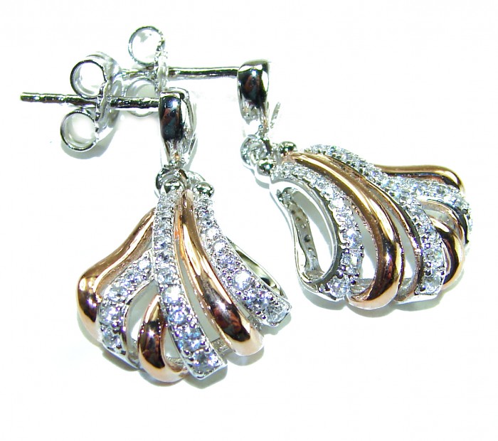 Extravaganza White Topaz 18K Gold over .925 Sterling Silver handcrafted Earrings - Elegant earrings with white topaz, gold, and silver, side view close-up