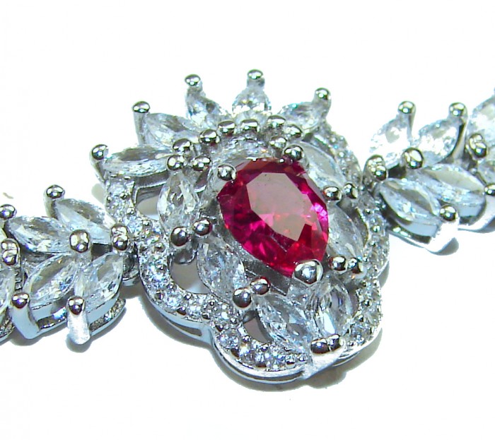 Natural 6.7 carat Ruby .925 Sterling Silver handmade Statement Bracelet - Close-up of natural ruby and sterling silver jewelry design.