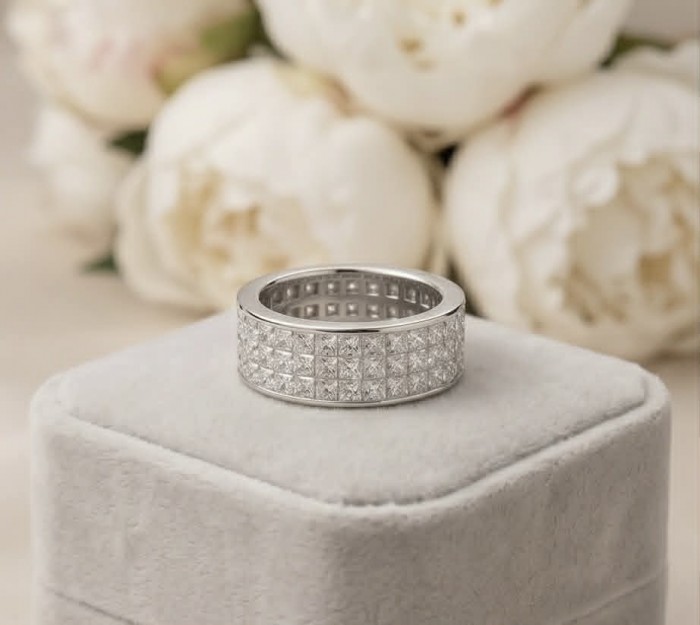 Luxurious pave 8.5 carat White Topaz .925 Sterling Silver Solid Infinity ring size 8 - Luxurious pave ring, top view, 8.5 carat white topaz on display cushion