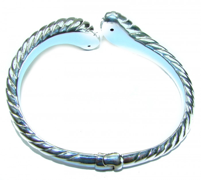 Italy made Bracelet in best quality highly polished .925 Sterling Silver - Silver bracelet with snake heads, top view showing twisted design.