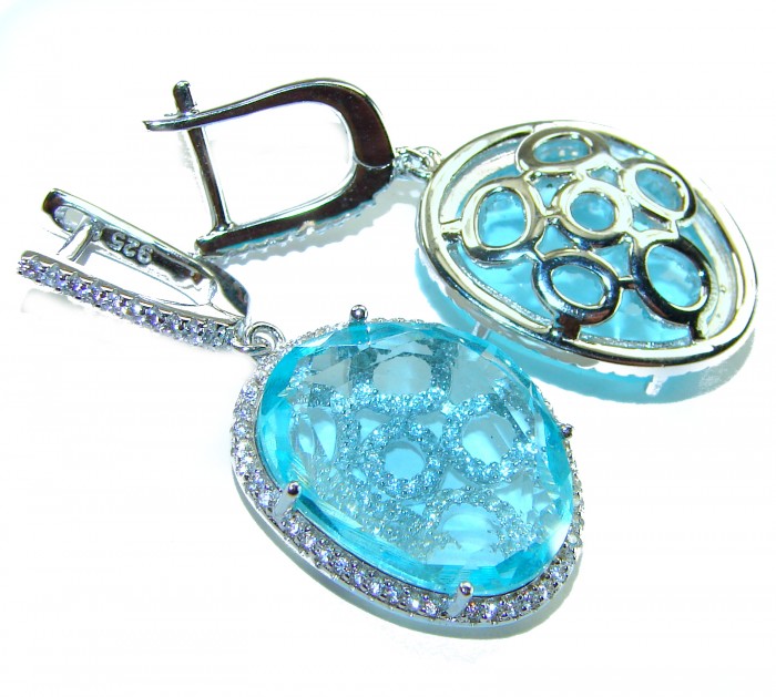 Eau Pure 18.5 carat Swiss Blue Topaz .925 Sterling Silver Handcrafted Earrings - Close-up of Swiss Blue Topaz earrings with clasp detail.