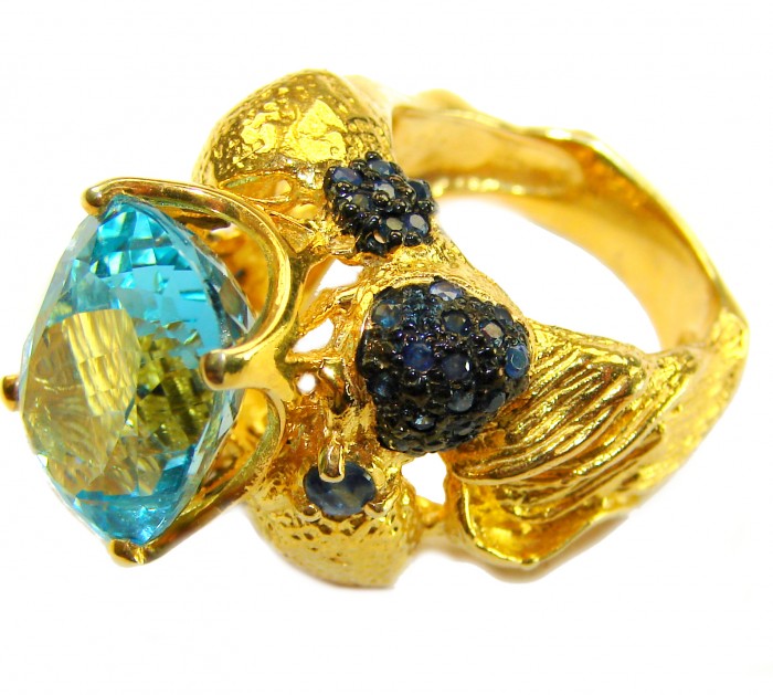 Poseidon 24.8 carat Swiss Blue Topaz 0.7 carat Black Diamond .925 Sterling Silver dipped in 22K Gold handcrafted Large ring size 7 - Gold ring with blue topaz and black diamonds, side view.